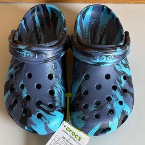 Brand new CROCS Kids Black and Blue Patterned Clogs size J5